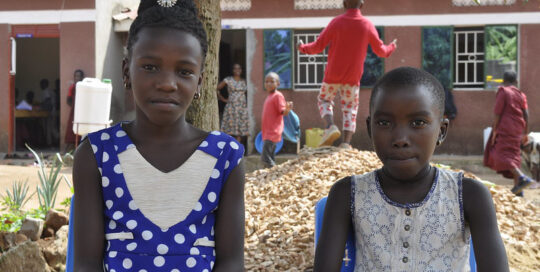 Two young school girls Uganda Buddhist Centre