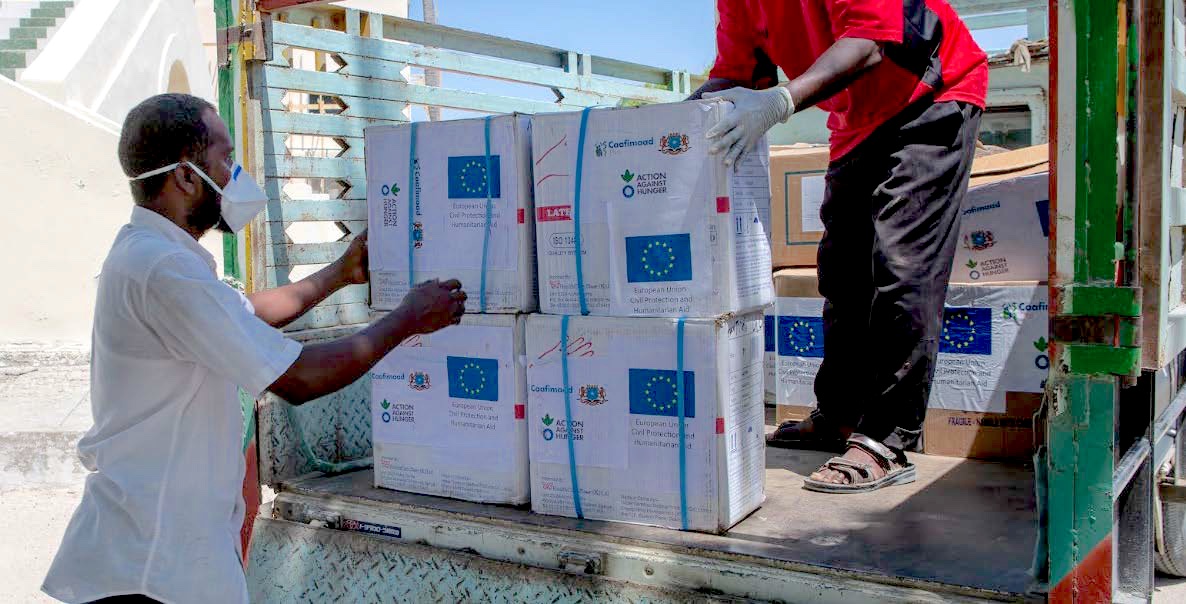 BGR partner Action Against Hunger loading food in Somalia.